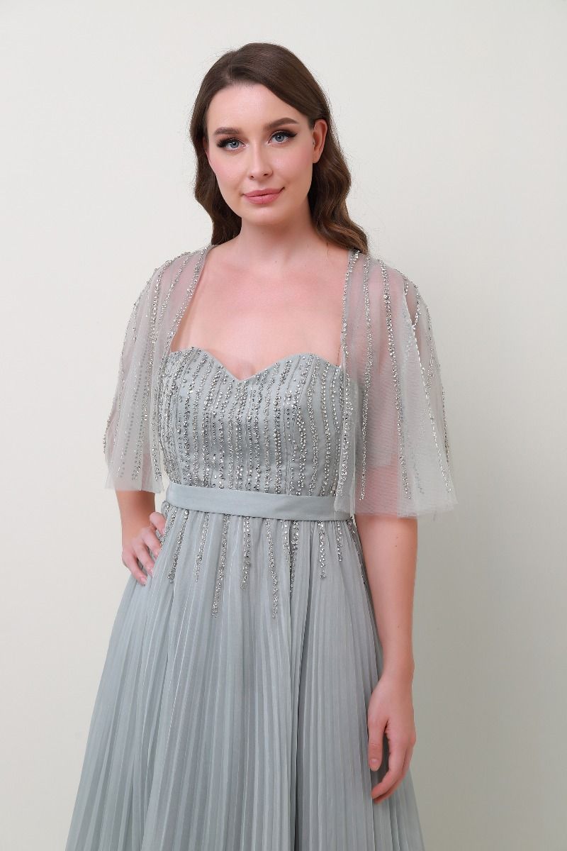 Embellished cape dress